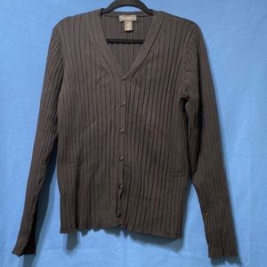 Used Van Heusen cardigan with V necklace and buttons in a front good condition
